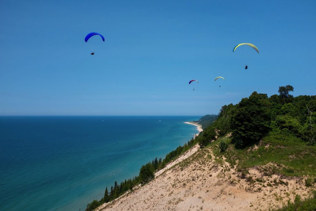 green point flyers association paraglider pilot paragliding hang glider hang gliding lake michigan frankfort pier lighthouse elberta northern michigan benzie county the betsie current newspaper
