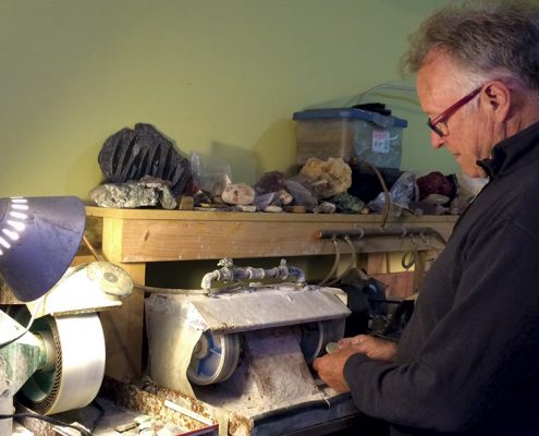 Dick Bayer in his rock shop at his home. Photo by Kelly Ottinger.